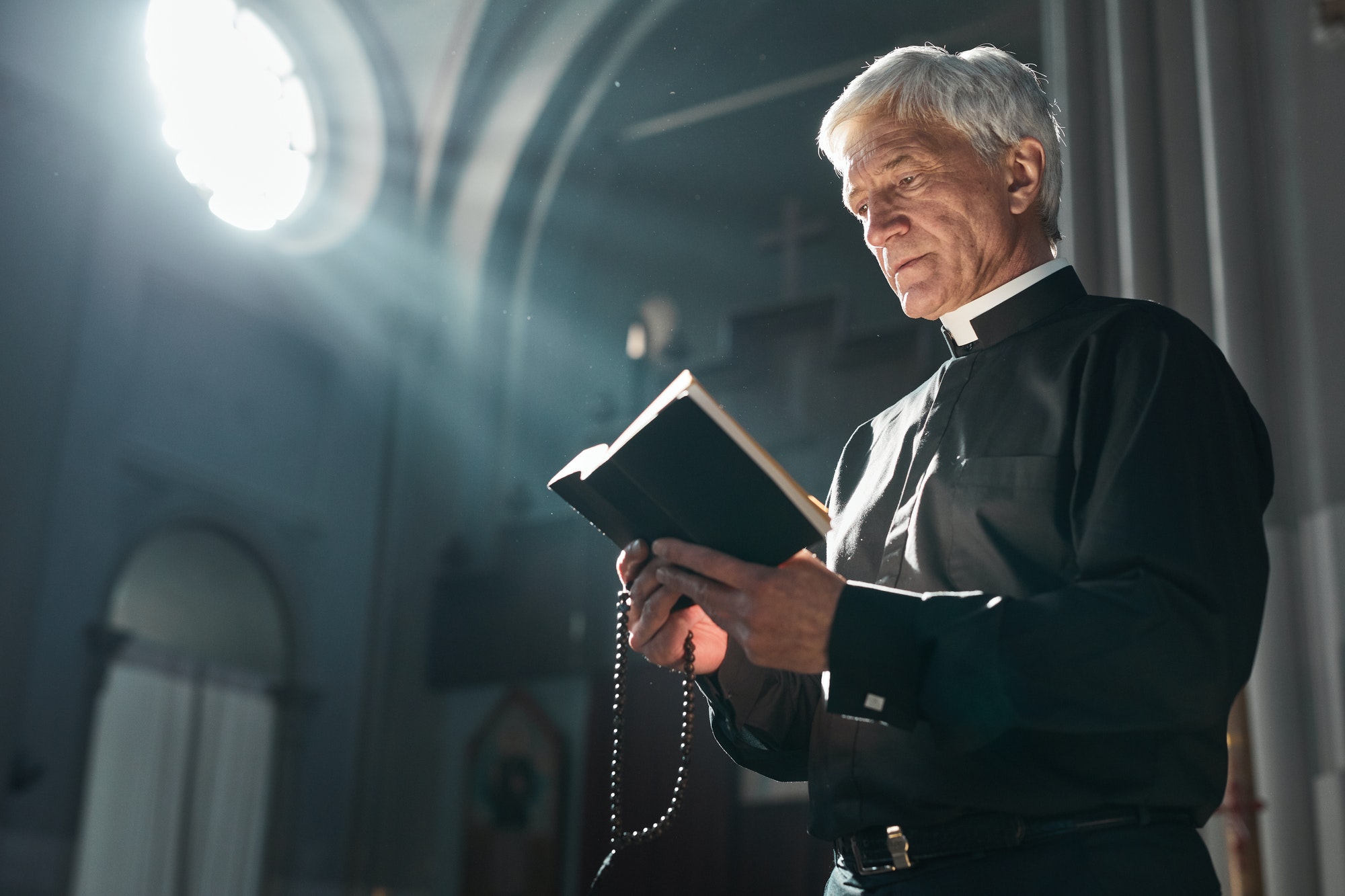 senior-priest-with-the-bible.jpg
